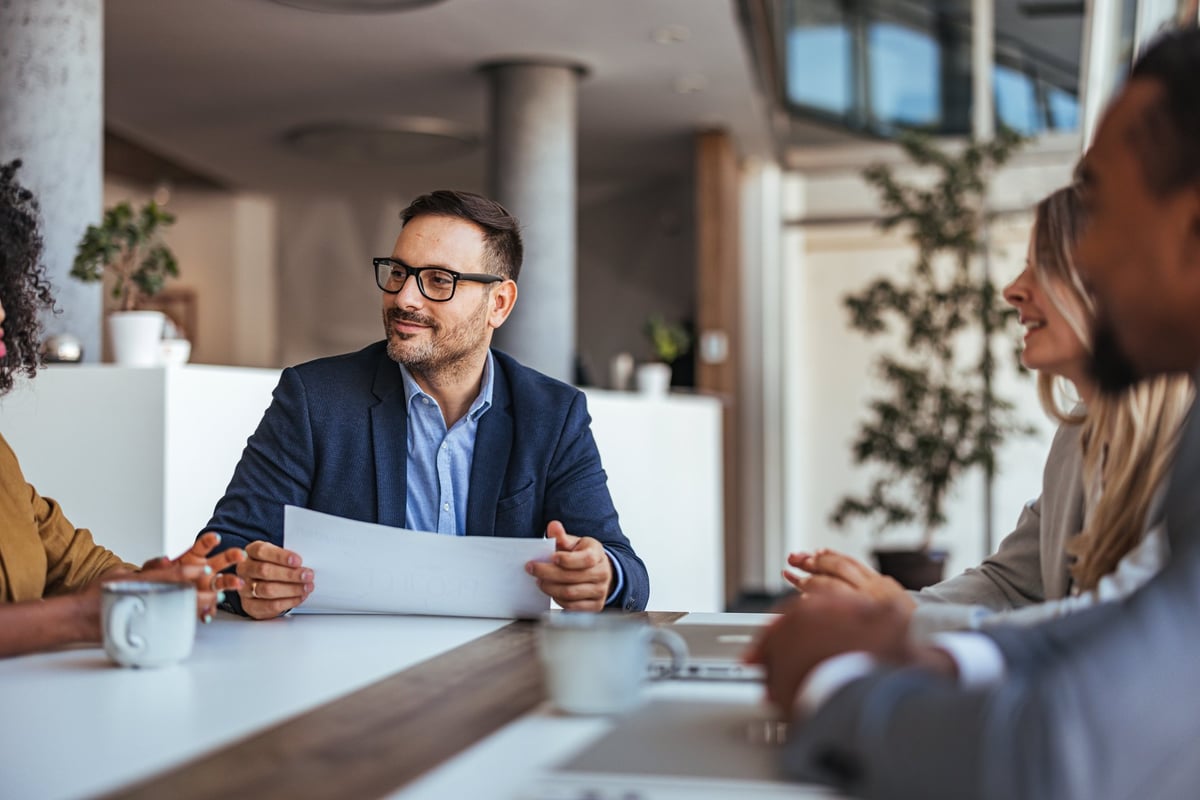 Customer reviewing financial options with sales consultant