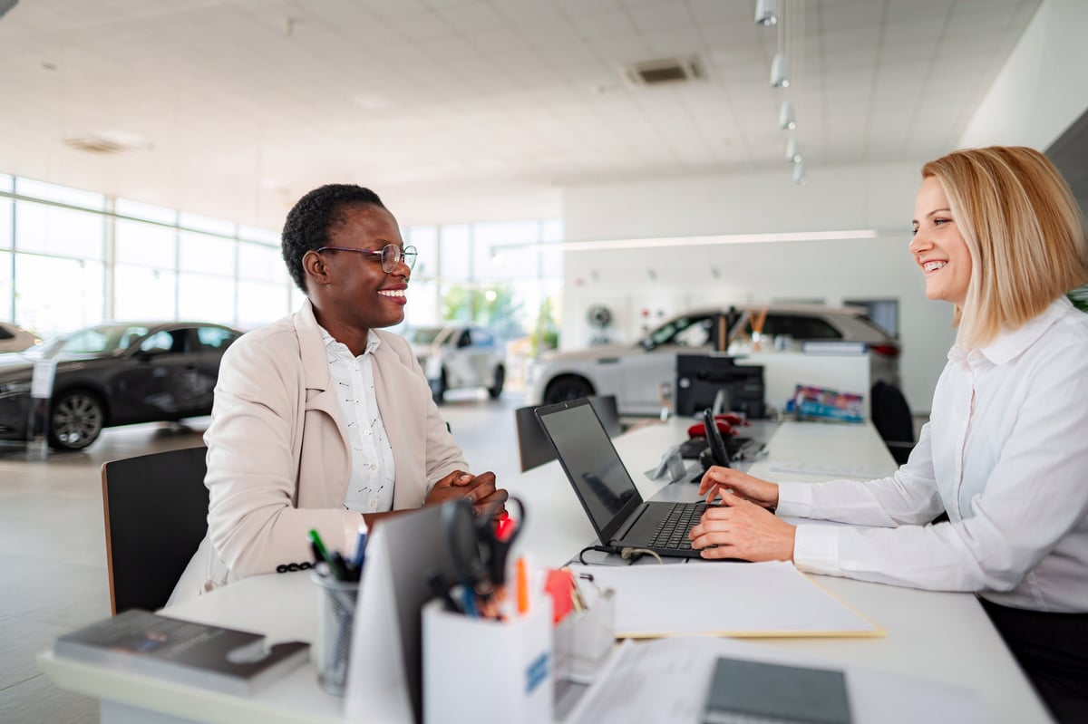 Sales consultant reviewing payment options with customer