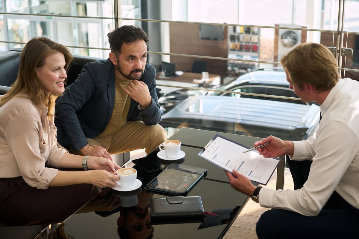 Sales consultant reviewing payment options with customer